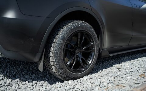 Solid Black Tesla Model Y - Unplugged Performance UP-02 Offroad Configuration Wheels