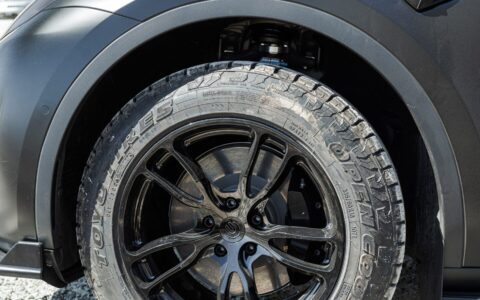 Solid Black Tesla Model Y - Unplugged Performance UP-02 Offroad Configuration Wheels