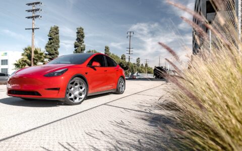 Red Multi Coat Tesla Model Y UP CYBRHX Wheels in Satin Titanium Image 19