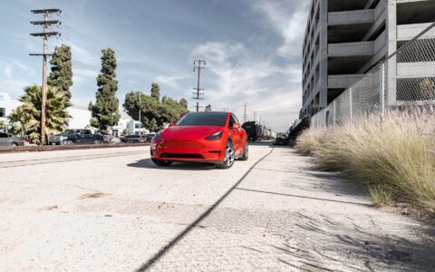 Red Multi Coat Tesla Model Y UP CYBRHX Wheels in Satin Titanium Image 20