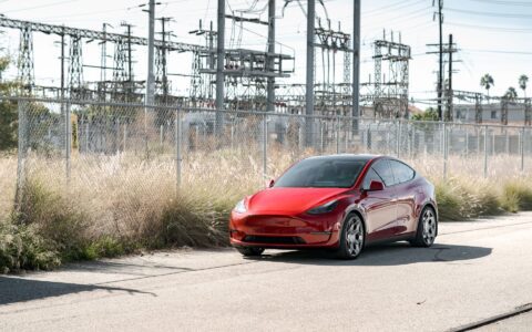 Red Multi Coat Tesla Model Y UP CYBRHX Wheels in Satin Titanium Image 3