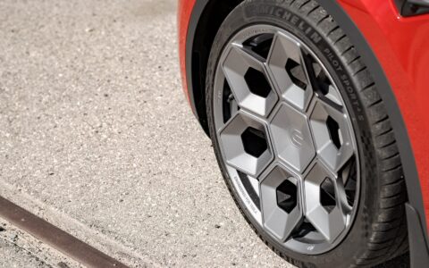 Red Multi Coat Tesla Model Y UP CYBRHX Wheels in Satin Titanium Image 36