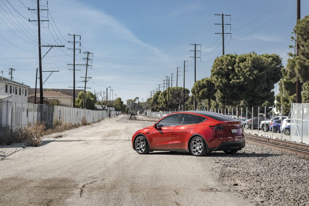 Red Multi-Coat Tesla Model Y – UP CYBRHEX Forged Wheels in Satin Titanium