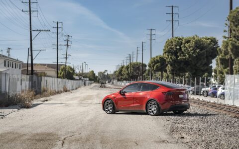 Red Multi Coat Tesla Model Y UP CYBRHX Wheels in Satin Titanium Image 45