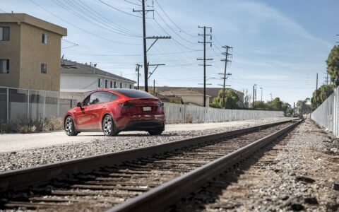 Red Multi Coat Tesla Model Y UP CYBRHX Wheels in Satin Titanium Image 46