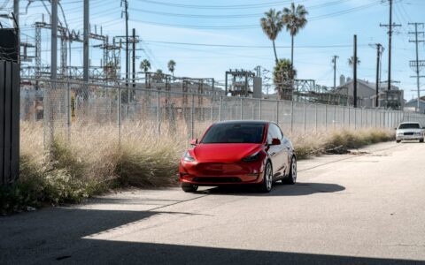 Red Multi Coat Tesla Model Y UP CYBRHX Wheels in Satin Titanium Image 5
