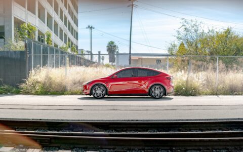Red Multi Coat Tesla Model Y UP CYBRHX Wheels in Satin Titanium Image 6