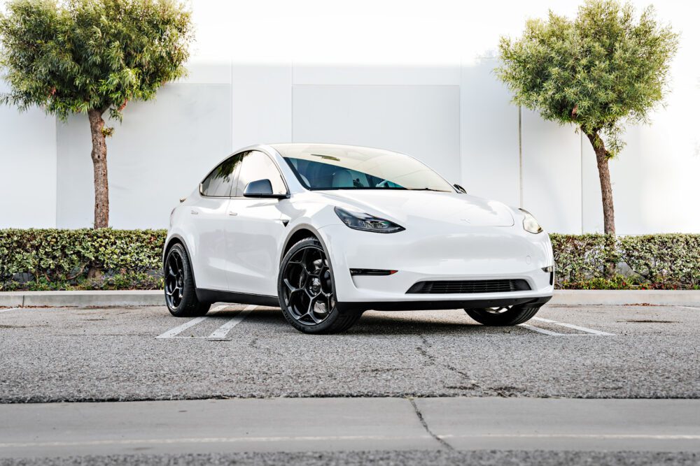 White Tesla Model Y on 21 inch UP-05 Forged Wheels in Gloss Black
