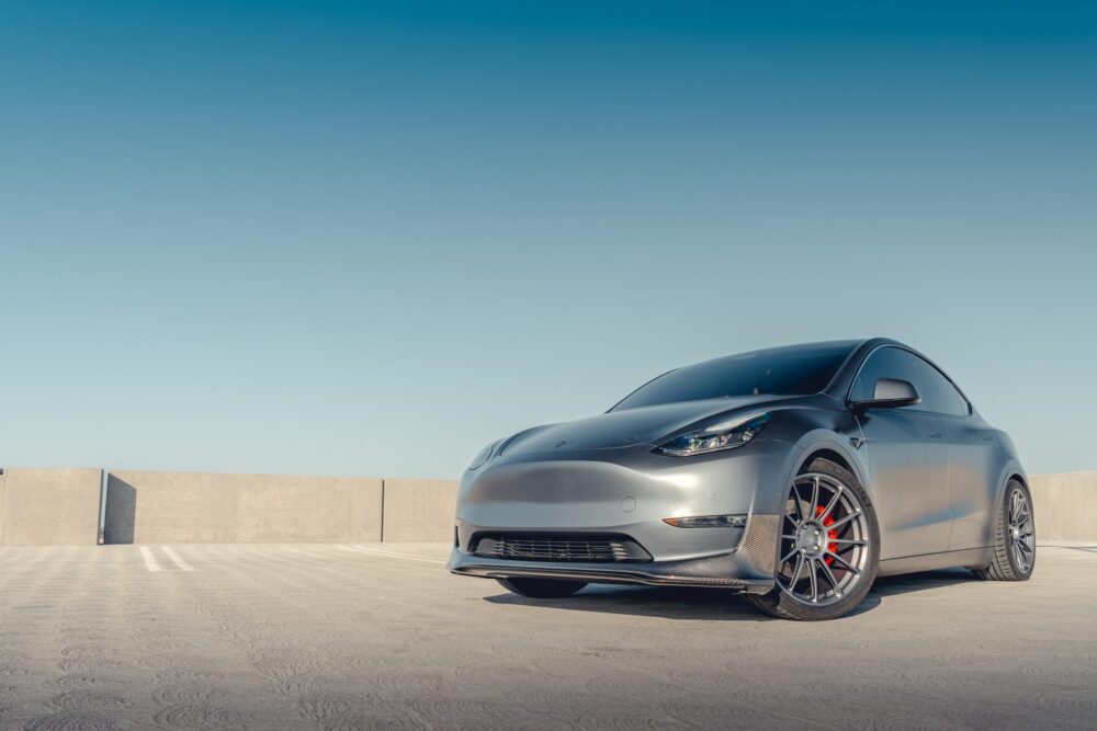 Gray Tesla Model Y – Front Lip Spoiler And UP-03 Forged Wheels In Satin Titanium