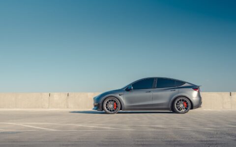 Gray Tesla Model Y - Front Lip Spoiler And UP-03 Wheels In Satin Titanium