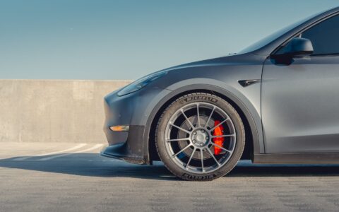 Gray Tesla Model Y - Front Lip Spoiler And UP-03 Wheels In Satin Titanium