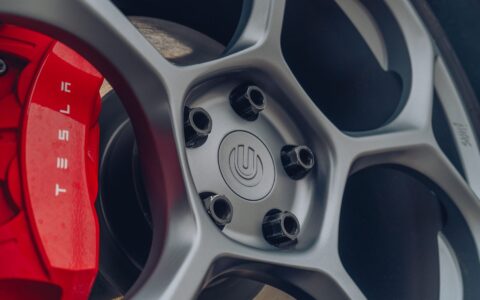 Pearl White Tesla Model Y - UP-05 Forged Wheels in Satin Titanium 16 Pearl White Tesla Model Y - UP-05 Wheels in Satin Titanium