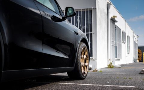 Diamond Black Tesla Model Y Juniper on CYBRHEX Forged Wheels in Satin Bronze
