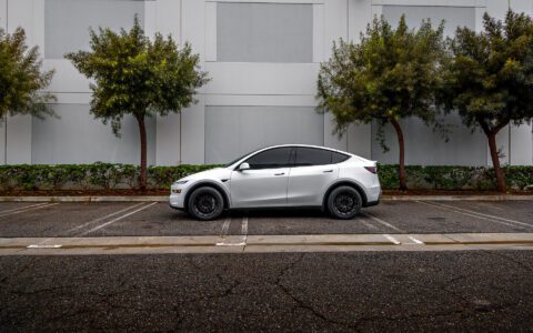 2026 Pearl White Model Y Juniper on 18 inch Off-Road Spec UP-03 in Satin Black