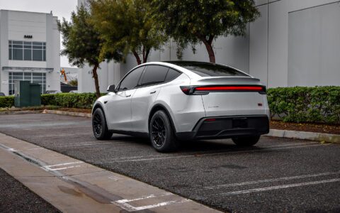 2026 Pearl White Model Y Juniper on 18 inch Off-Road Spec UP-03 in Satin Black