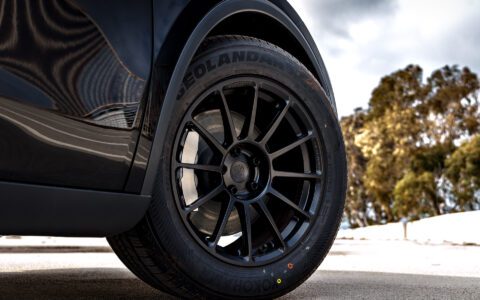 2026 Diamond Black Model Y Juniper on 18 inch Off-Road Spec UP-03 in Satin Black