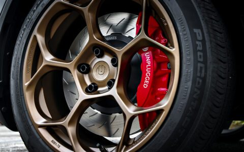 Black 2026 Tesla Model Y Juniper with Big Brake Kit on UP Forged UP-05 in Satin Bronze