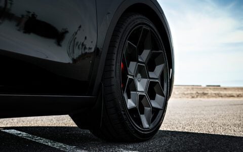 Tesla Model Y Wheel Spacers: The Easiest Way to a Flush, Planted Stance 10 Black Tesla Model Y on 22-Inch UP Forged CYBRHEX Wheels in satin Black